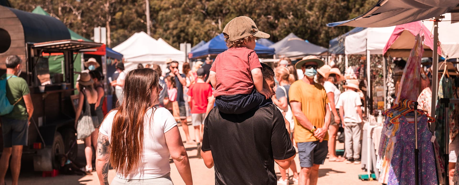 Market stalls with vintage clothing, homewares, and secondhand treasures